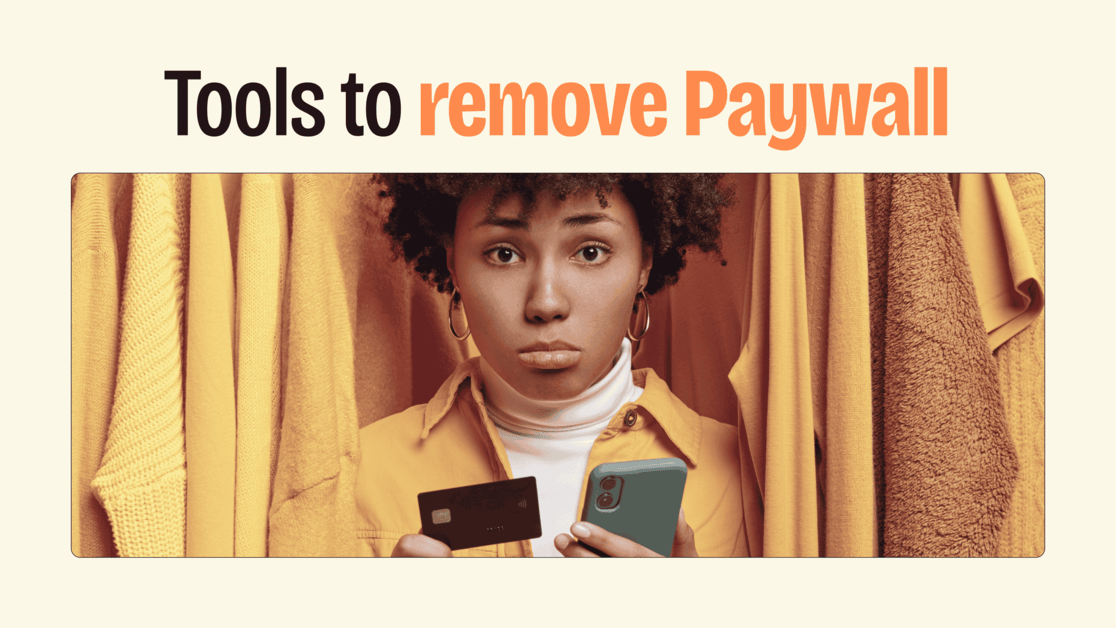 A lady dressed in yellow jacket with a sad face holds a phone and a credit card while staning in a closet